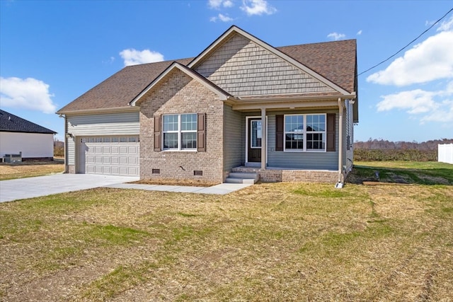 view of front of home featuring a front yard and a garage