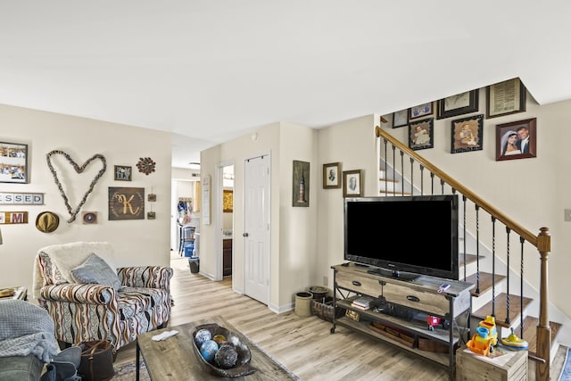 living room with light hardwood / wood-style floors