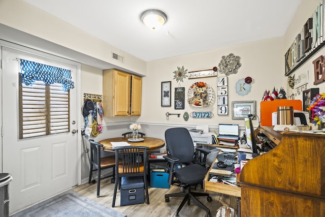 office space featuring light wood-type flooring