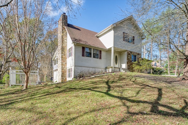 front facade with a front lawn