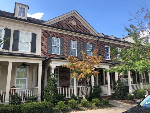 multi unit property with ceiling fan and covered porch