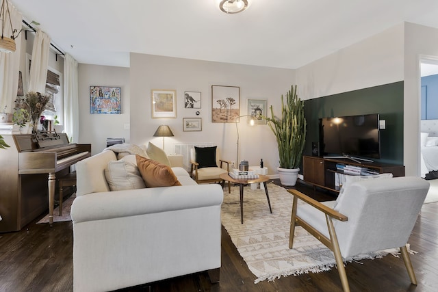 living room with dark hardwood / wood-style floors