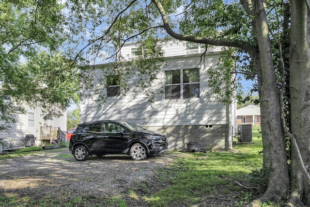 view of home's exterior featuring cooling unit