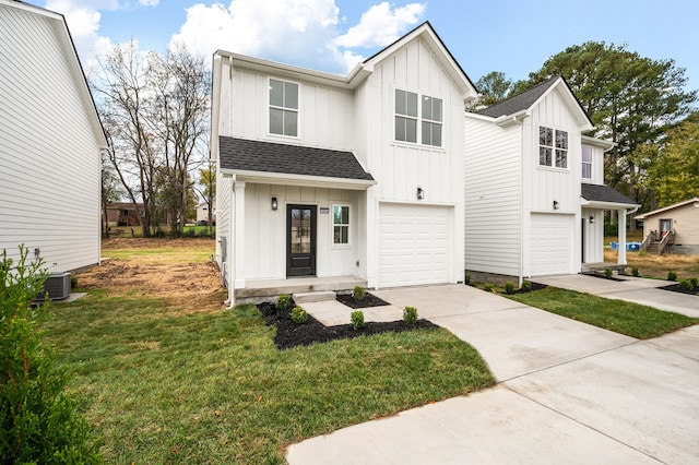 modern farmhouse with a front yard, a garage, and central AC unit