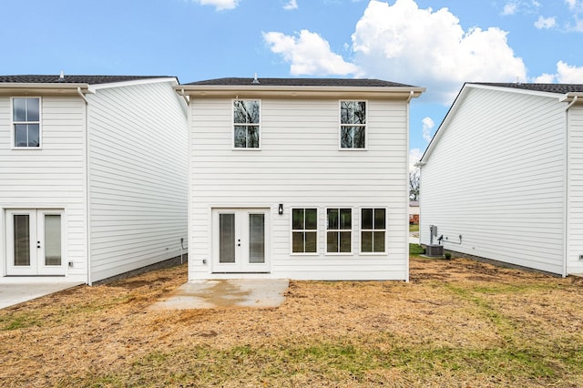 back of house with french doors, a patio, and central AC unit