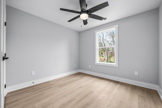 unfurnished room with light hardwood / wood-style floors and ceiling fan