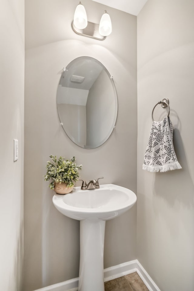 bathroom with tile patterned flooring