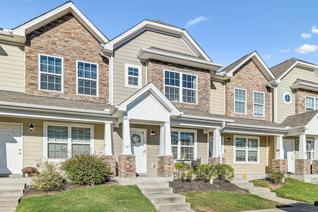 multi unit property featuring covered porch