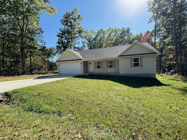 single story home featuring a garage and a front yard