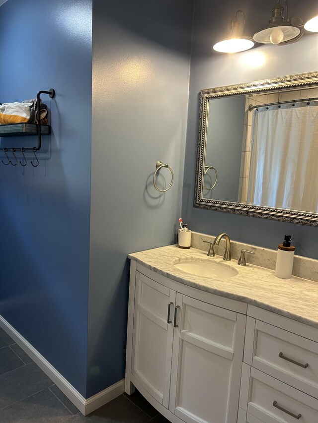 841 Asbury Dr, New Johnsonville, TN 37134 - full bath featuring tile patterned flooring, vanity, and baseboards