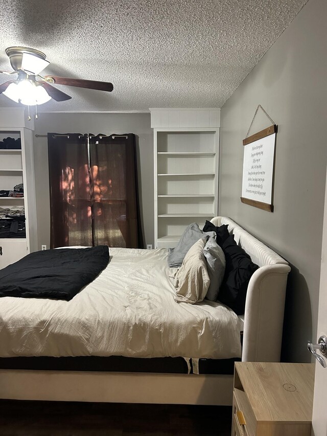 841 Asbury Dr, New Johnsonville, TN 37134 - bedroom featuring a textured ceiling and ceiling fan