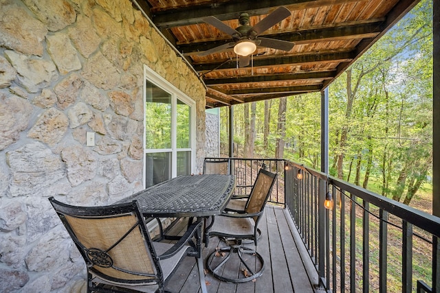 exterior space featuring ceiling fan