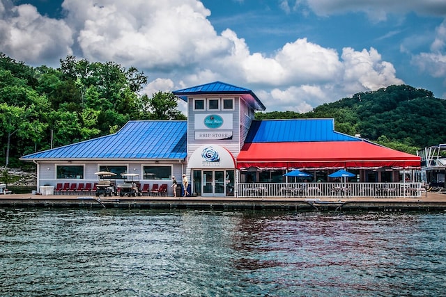 exterior space with a water view