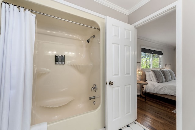 bathroom featuring shower / bath combination with curtain, ornamental molding, and hardwood / wood-style floors