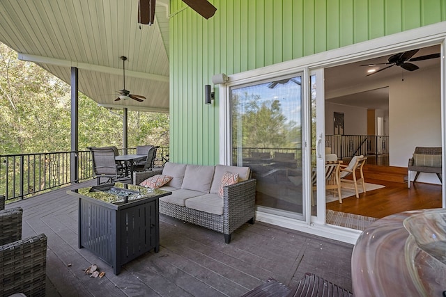 view of patio / terrace featuring outdoor lounge area, a deck, and ceiling fan