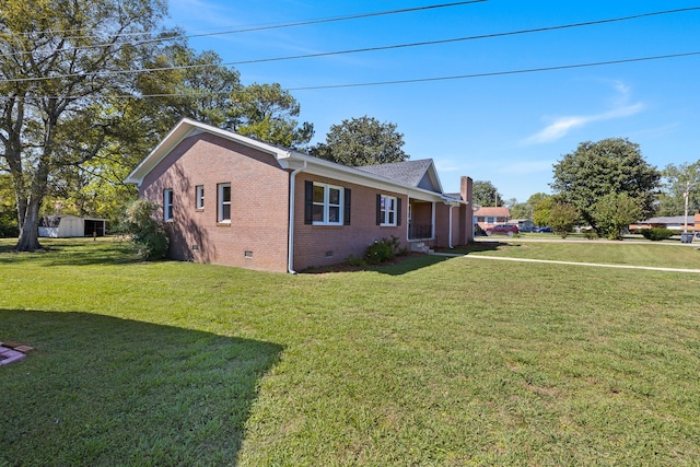 view of property exterior with a lawn