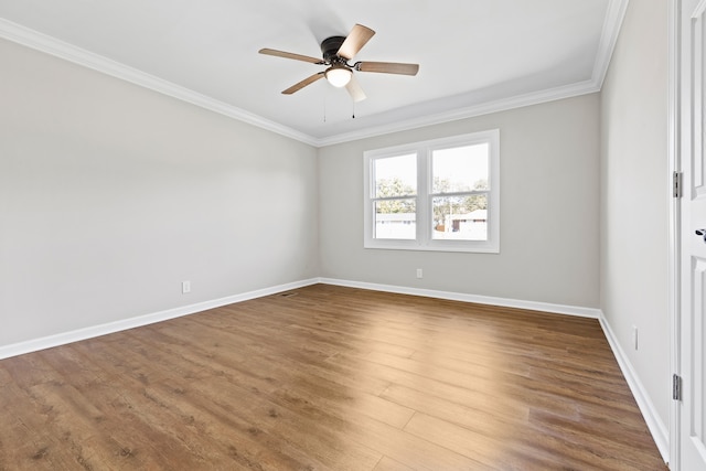 unfurnished room with ceiling fan, ornamental molding, and hardwood / wood-style floors