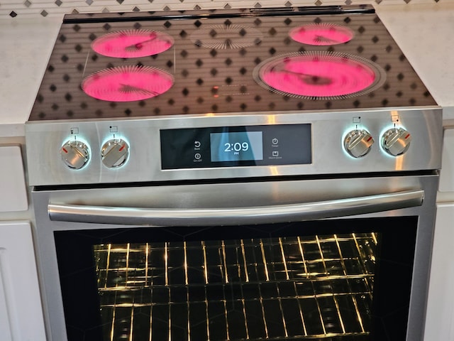 interior details with high end stainless steel range oven