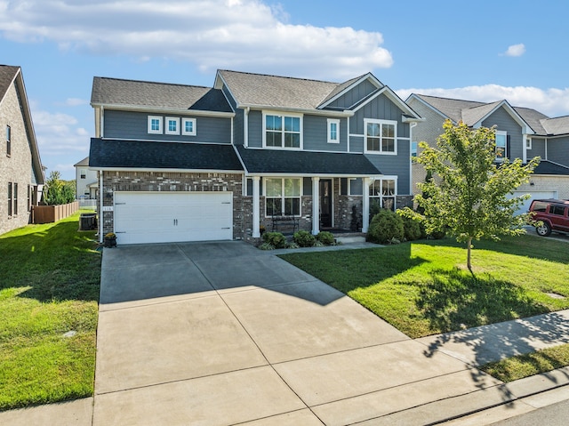 view of front of property with a porch, a front lawn, central AC unit, and a garage