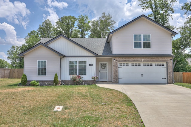 view of front property featuring a garage and a front lawn