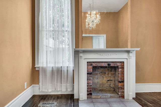 interior details with an inviting chandelier and wood-type flooring