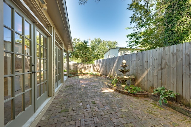 view of patio featuring french doors