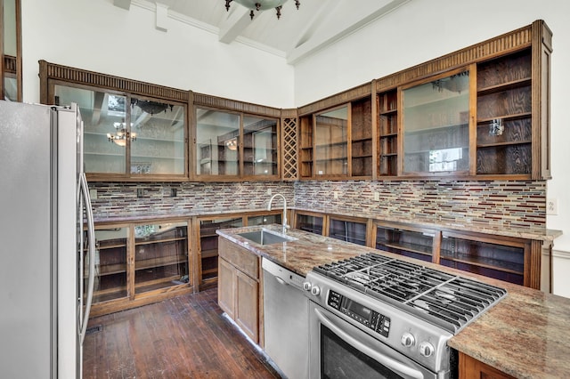 kitchen featuring dark hardwood / wood-style floors, stainless steel appliances, light stone countertops, backsplash, and vaulted ceiling with beams