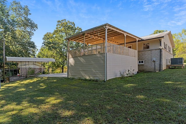 view of property exterior with a yard and a wooden deck