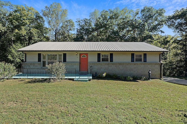 111 Parkview Dr, Mcminnville, TN 37110 - ranch-style home with a front yard, stone siding, and metal roof