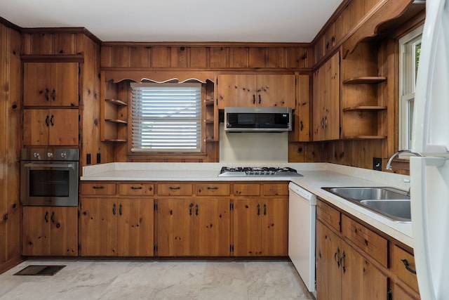 kitchen with appliances with stainless steel finishes and sink