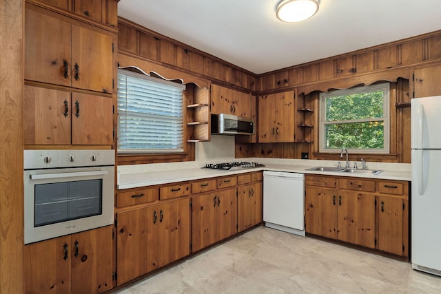 111 Parkview Dr, Mcminnville, TN 37110 - kitchen featuring stainless steel appliances, light countertops, a sink, and open shelves