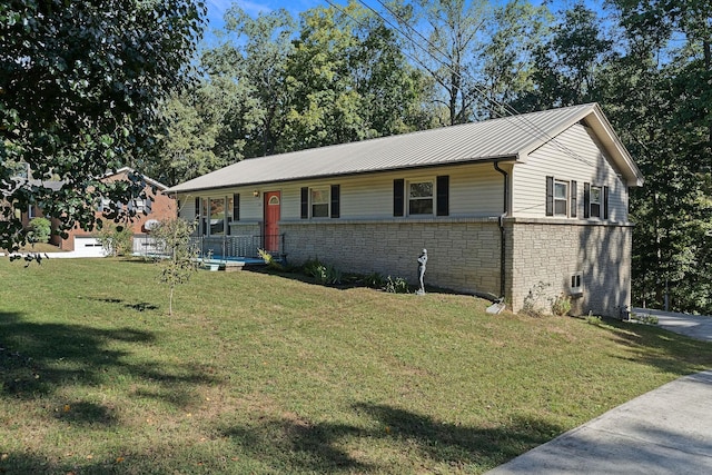 111 Parkview Dr, Mcminnville, TN 37110 - single story home with a front yard, stone siding, covered porch, and metal roof