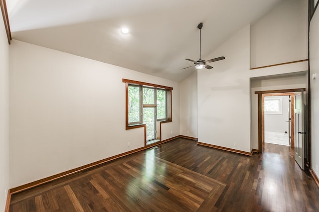 empty room featuring ceiling fan, dark hardwood / wood-style floors, and high vaulted ceiling