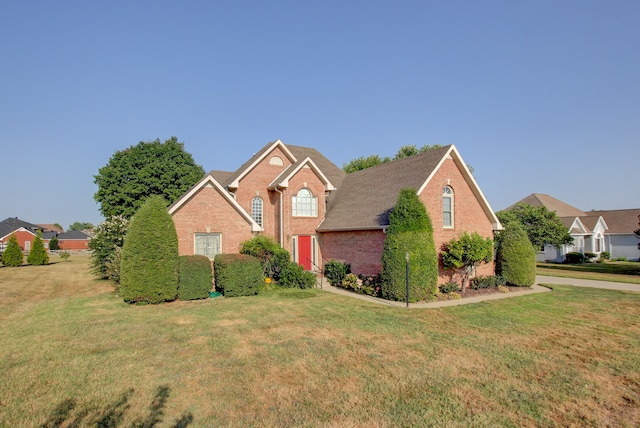 front of property featuring a front lawn