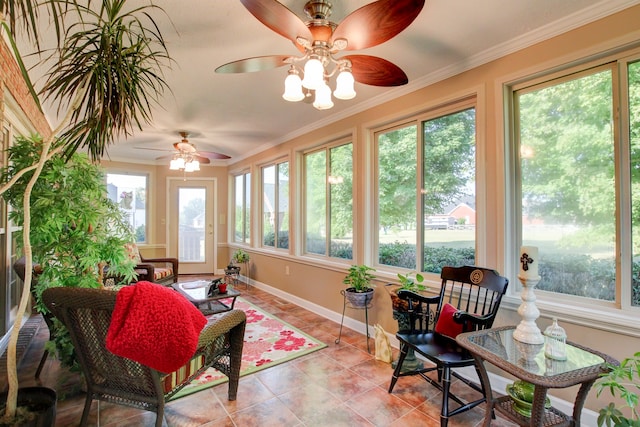 sunroom with a healthy amount of sunlight and ceiling fan