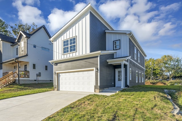 view of front facade with a garage and a front lawn