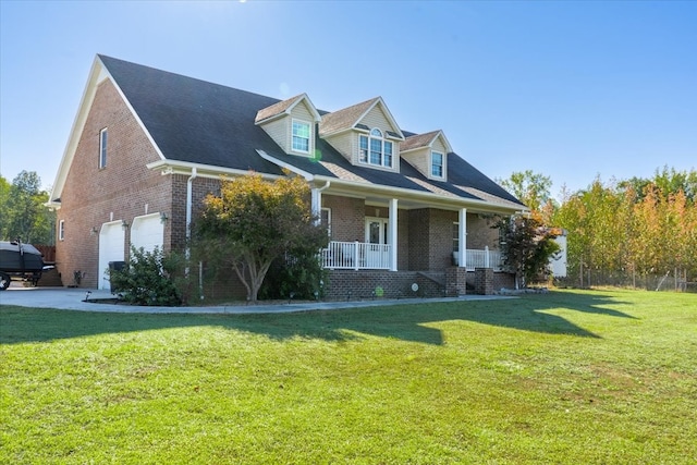 cape cod-style house with a garage, a porch, and a front yard