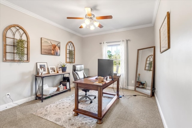 home office featuring carpet floors, crown molding, and ceiling fan