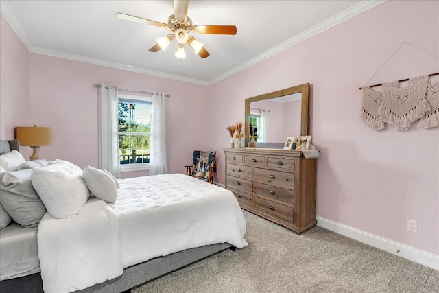 bedroom with ornamental molding, ceiling fan, and carpet