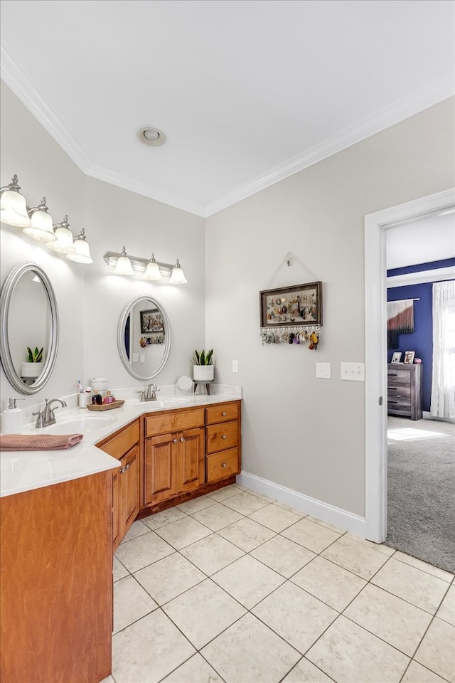 bathroom with vanity, crown molding, and tile patterned floors