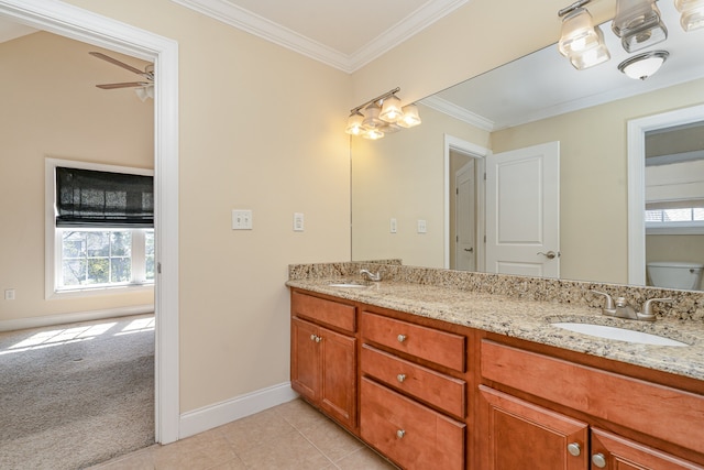 bathroom featuring ceiling fan, toilet, crown molding, tile patterned floors, and vanity