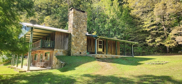 view of yard featuring a wooden deck