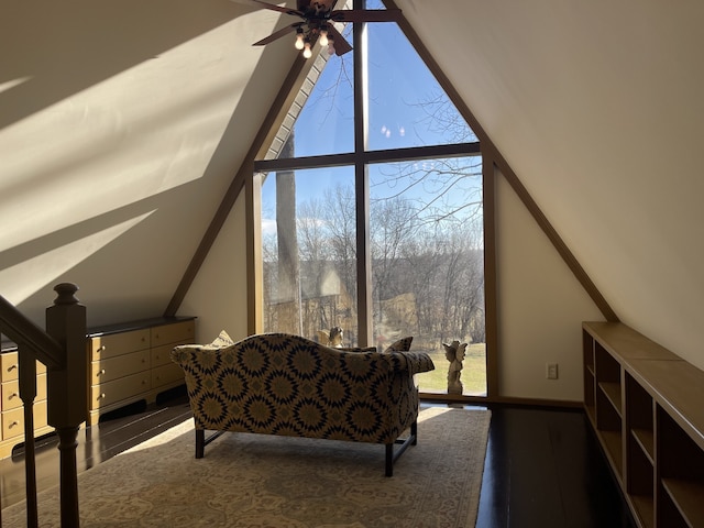 interior space with wood-type flooring, high vaulted ceiling, and ceiling fan