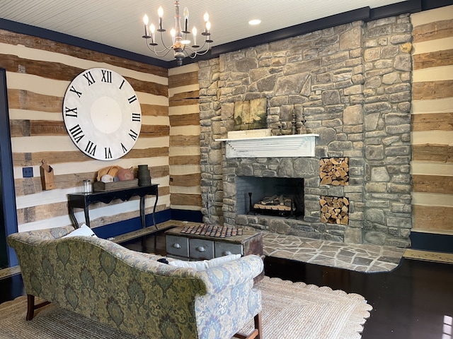 living room featuring hardwood / wood-style flooring and a stone fireplace