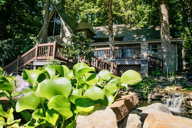 view of community with a wooden deck