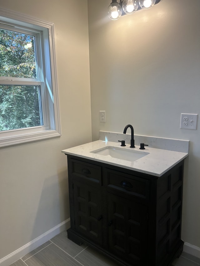 bathroom featuring vanity and tile patterned floors