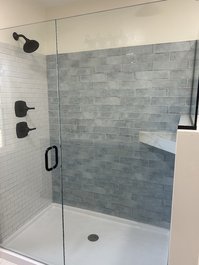 bathroom with walk in shower