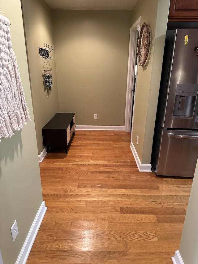 hall with light wood-type flooring