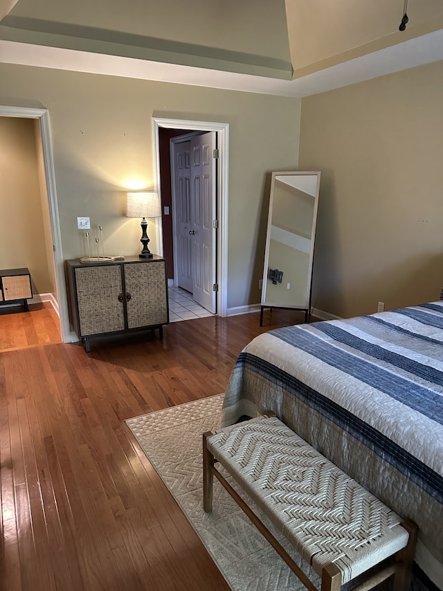 bedroom with wood-type flooring