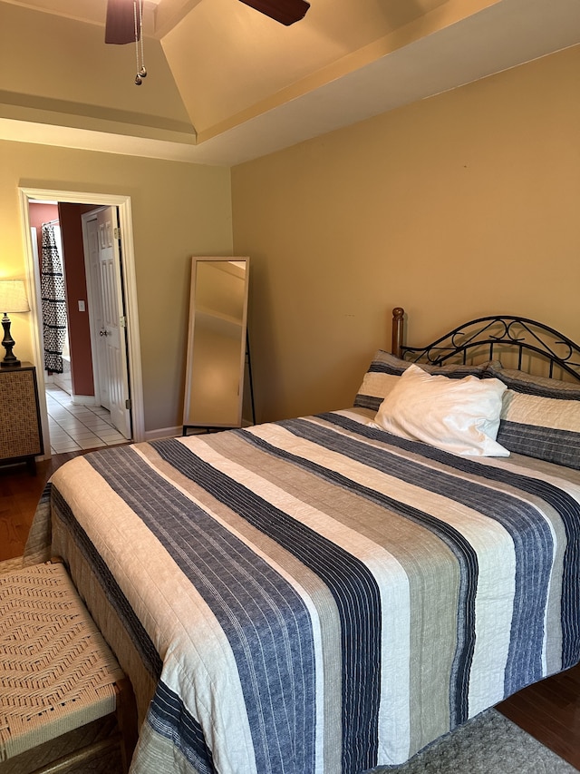 bedroom with hardwood / wood-style flooring and ceiling fan